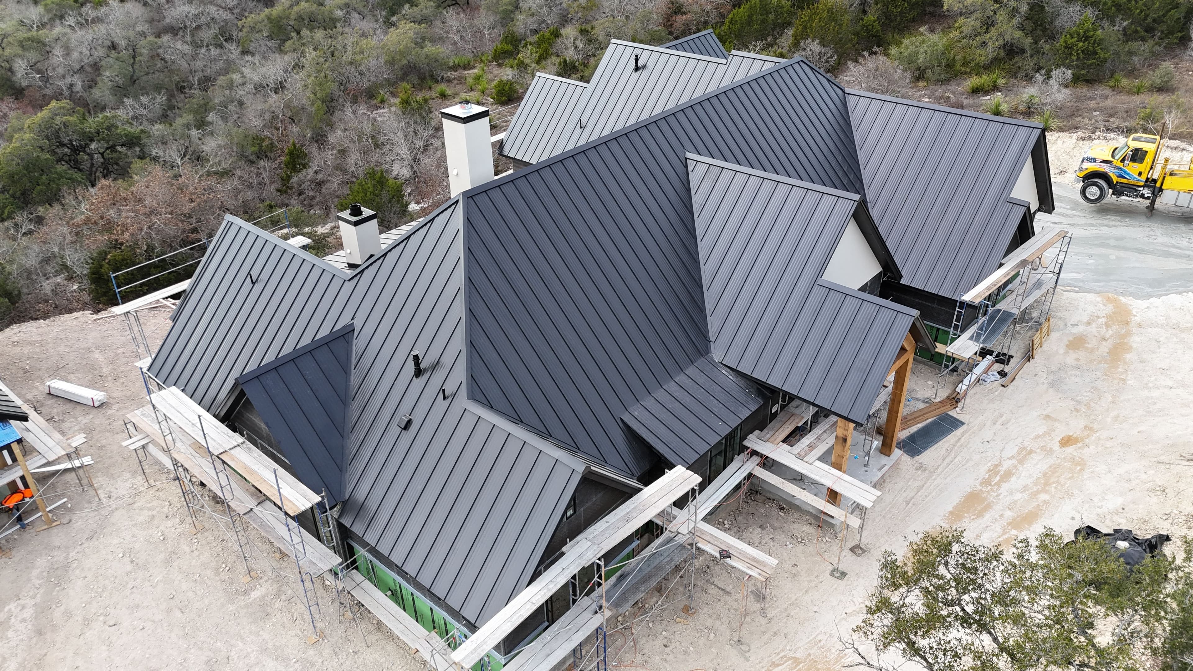 Project Modern Metal Roof Installation Surrounded by Nature image
