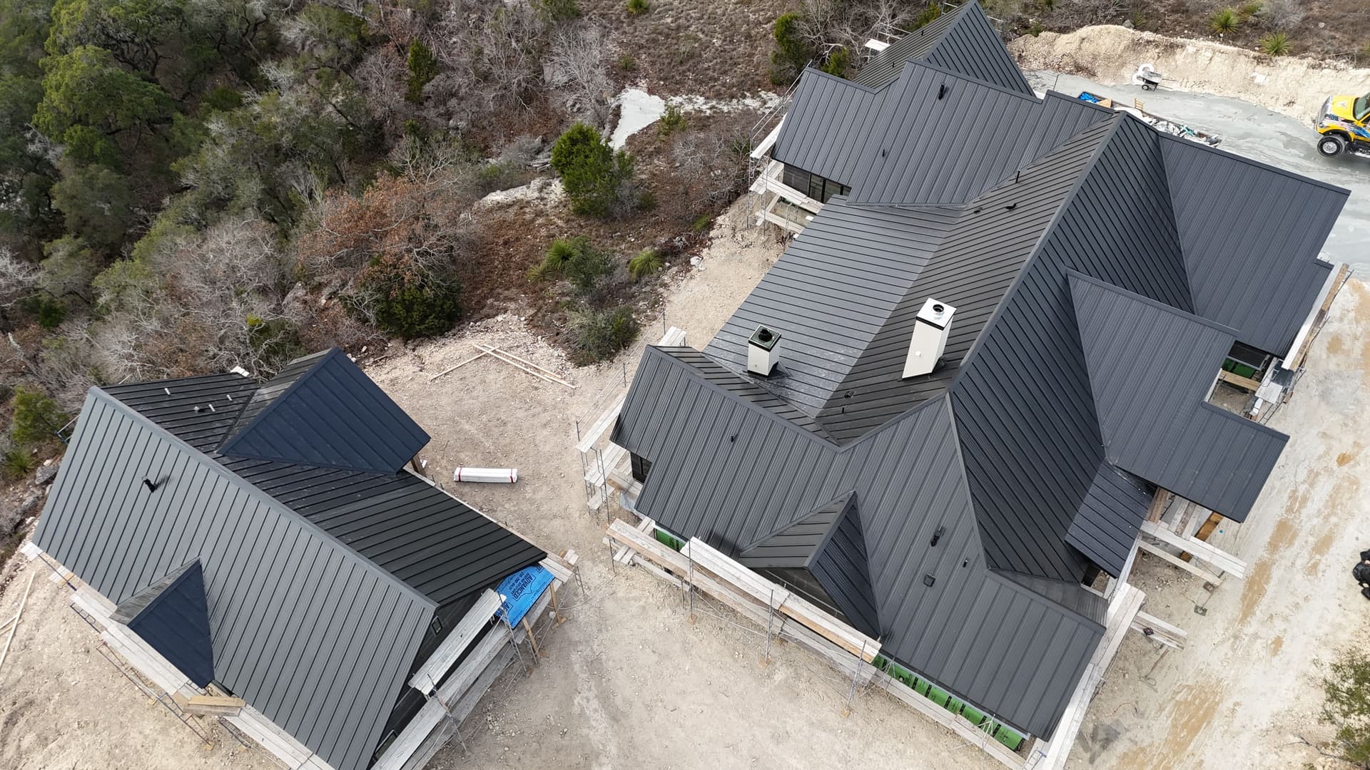 Gallery photos for Modern Metal Roof Installation Surrounded by Nature: Image #1