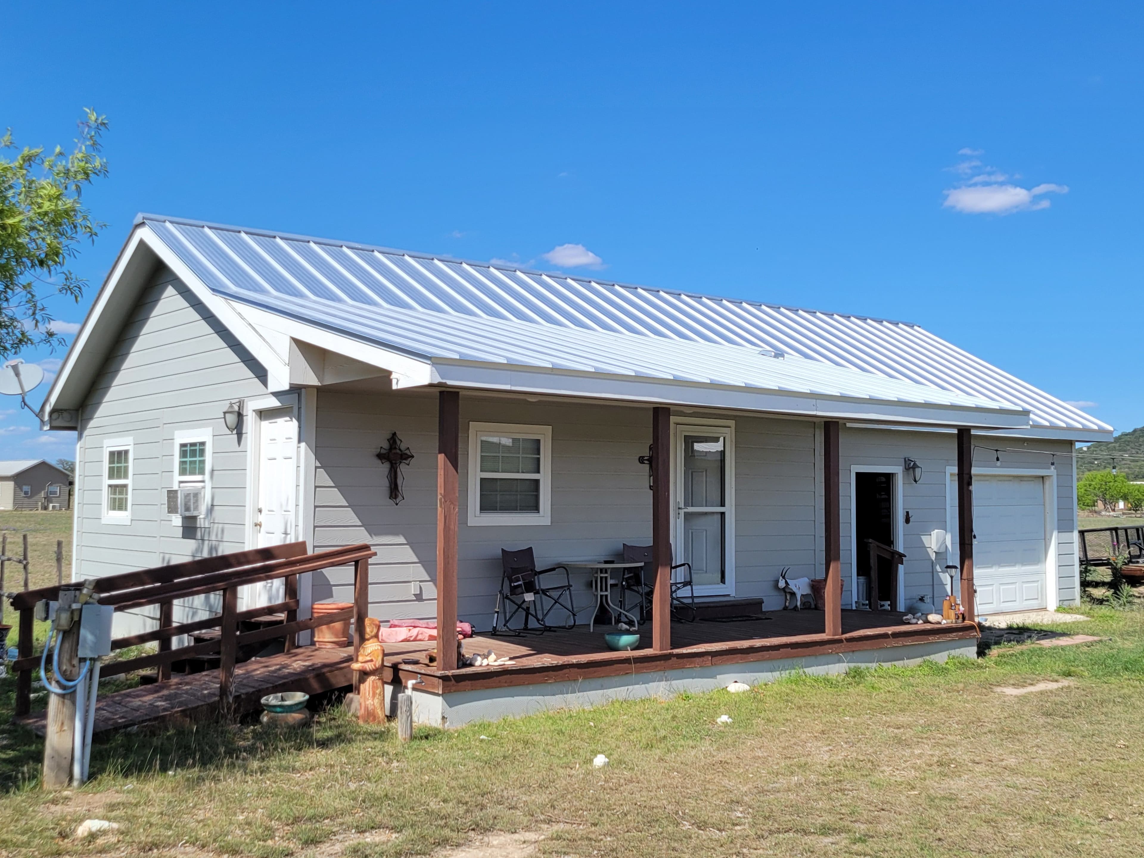 Project 22-Year-Old Hail-Damaged Shingle Roof Gets a 24-Gauge Metal Upgrade image