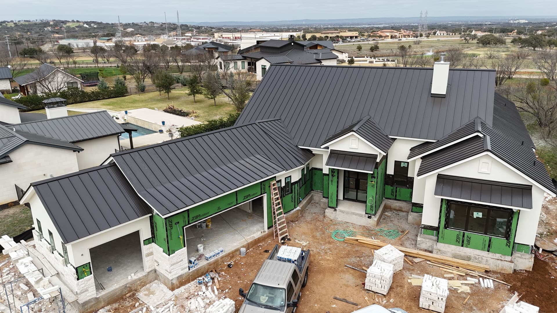 Custom Standing Seam Metal Roof in Dark Bronze