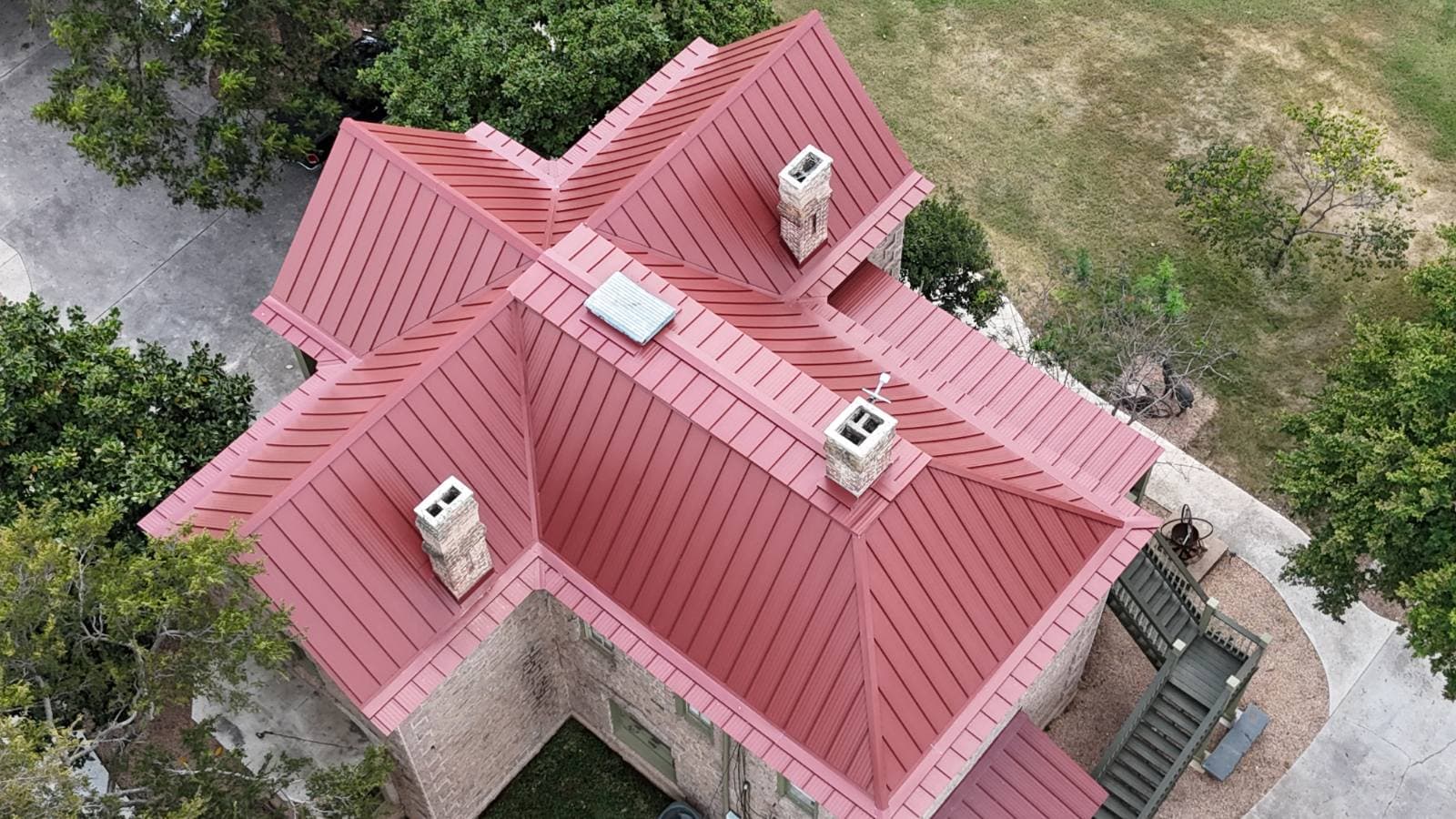 Gallery photos for Red Metal Roof Installation on Historic Badger House in Marble Falls: Image #1