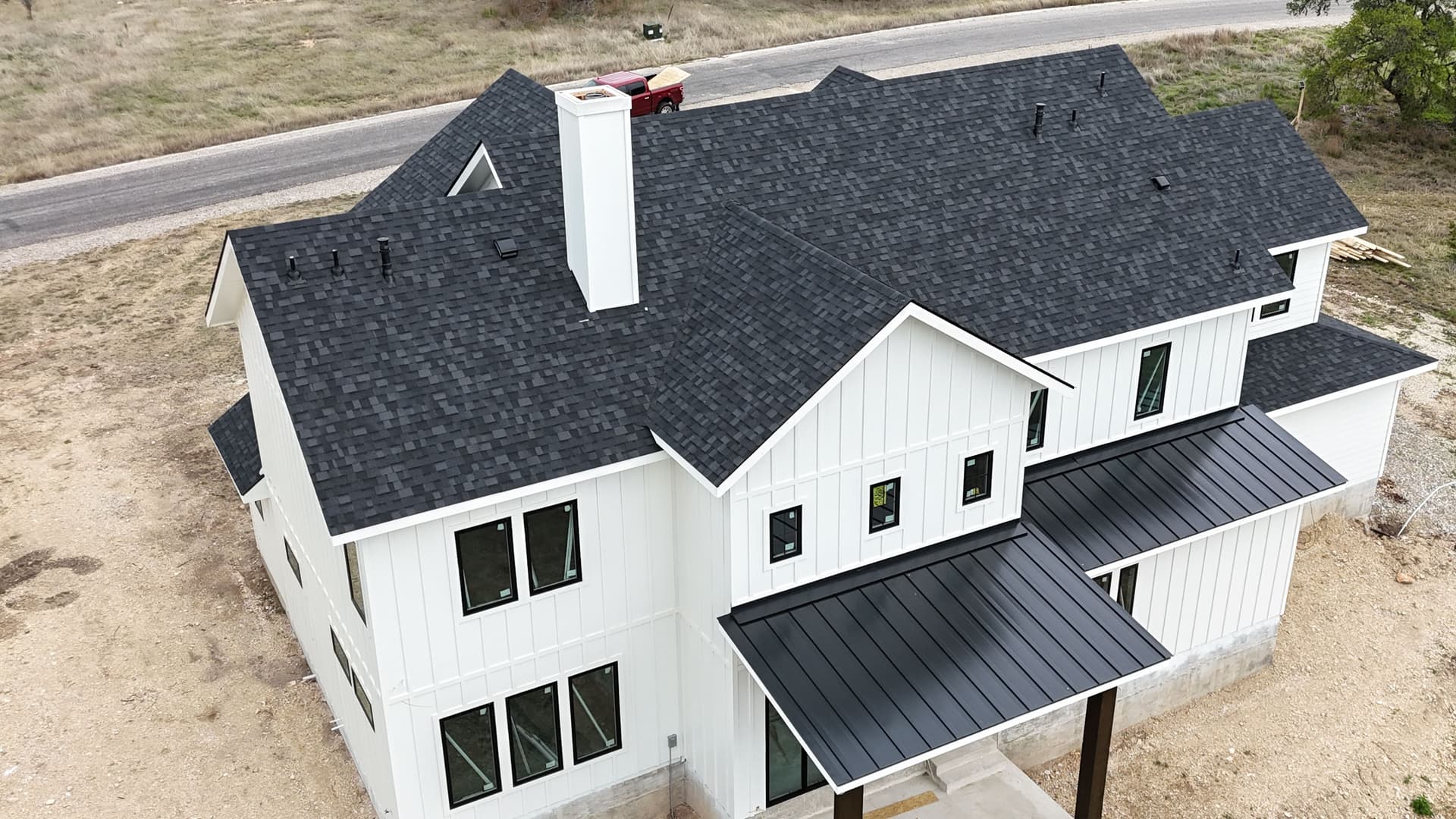 Gallery photos for Lifetime Shingle Roof with Metal Accents on a Modern Country Home: Image #1