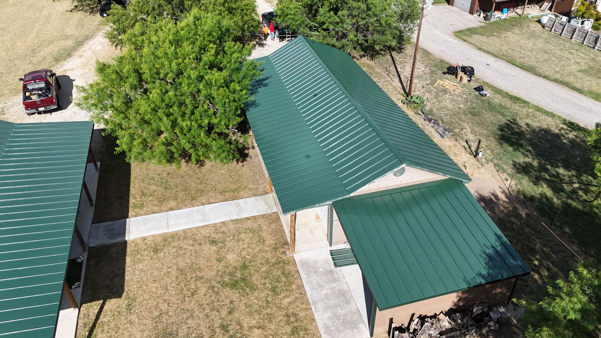 Gallery photos for Hail-Damaged R-Panel Roofs Upgraded to Class 4 Standing Seam: Image #2